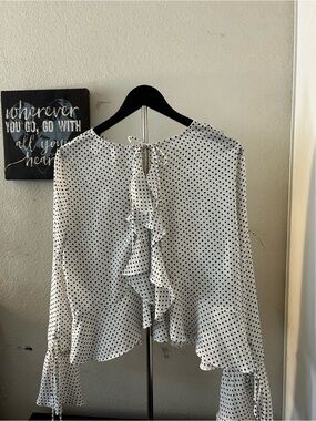 Elodie White Top with Black Polka Dots and Ruffle Hem